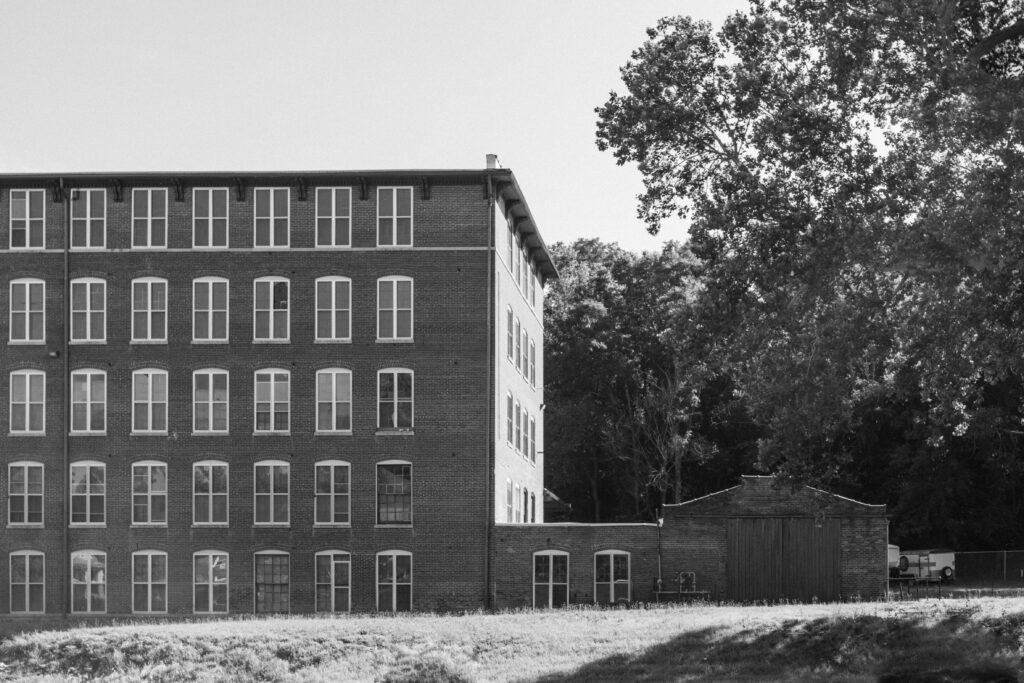 black and white photo of historic International Shoe Factory building